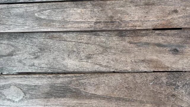 Rustic weathered wood plank texture background close up