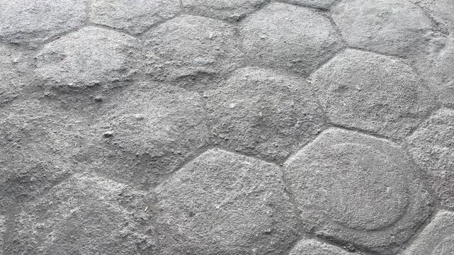 Grey hexagonal paving block pattern texture background