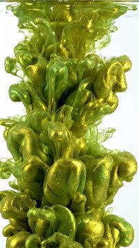 Lime Gold Paint Spreading in Water Seamless Loop 4K - Vibrant lime gold paint with shimmering particles disperses in clear water, creating an abstract and fluid motion.