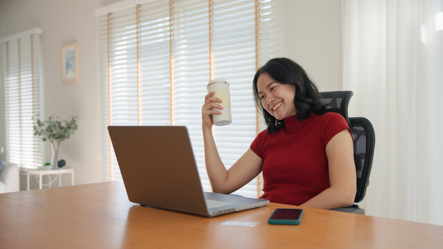 Young asian woman happy smile using search on phone Agent AI app retail shop store pay buy at home Modern Agentic bot order assisted people easy booking hotel ticket vacation smart life virtual wallet