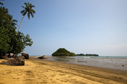 Wild Indonesian coastline facing verdant islets