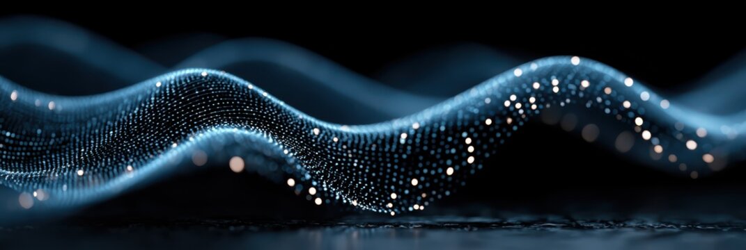 A glowing wave of blue digital particles forms a flowing, futuristic curve against a dark background, representing technology and data visualization.