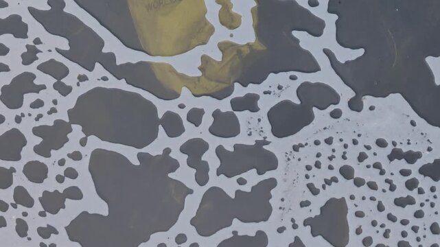 Hand-healed shot of canal close-up,