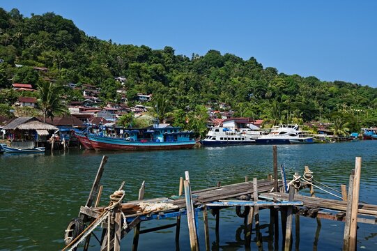 Traditional fishing village on the riverbank in Padang