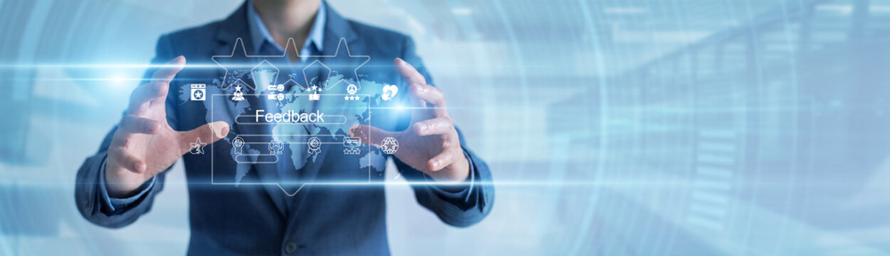 User hands hold a smartphone submitting a star-rated Feedback survey form. Customer reviews are essential to refine service quality and improve future product development processes.