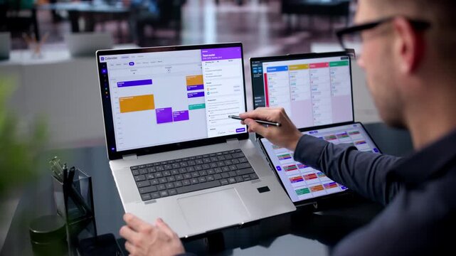 Young Businessman Checking Electronic Calendar