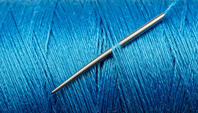 Needle piercing blue thread