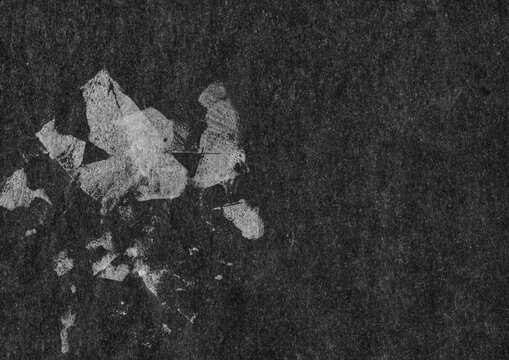 Abstract dark textured background with distressed light streaks and patterns
