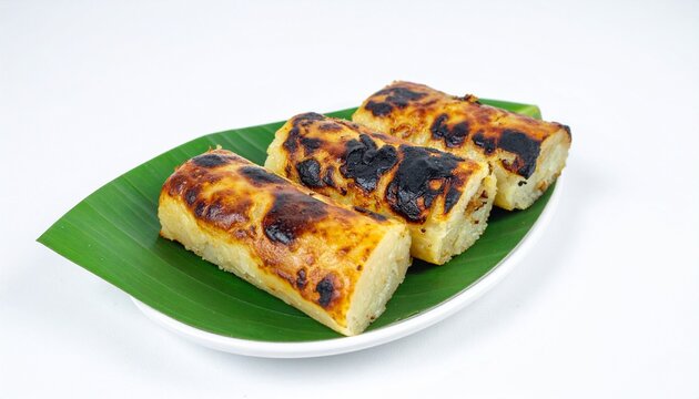 Pulut Panggang grilled glutinous rice rolls isolated on a white background with generous copy space