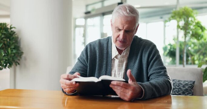 Home, faith and senior man with bible for religious study, spiritual growth or word of God. Retirement, pensioner or reading scripture in Holy book for christian wisdom, praise or learning the gospel