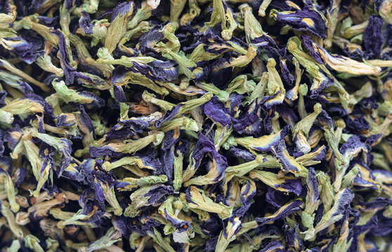 Closeup full-frame view of dried butterfly pea flowers.