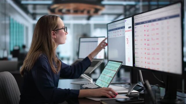 Vendor Risk Manager Carefully Reviewing Compliance Data