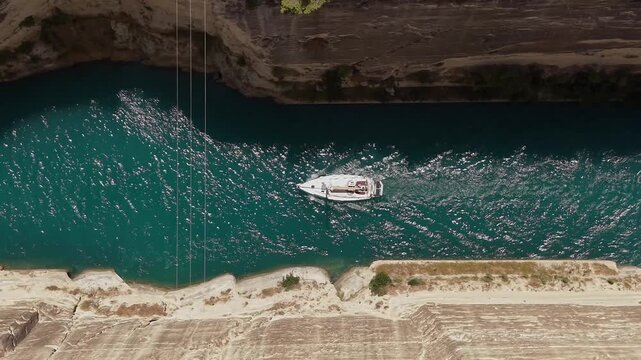 Small Sailing Yacht Crossing the Corinth Canal in Greece