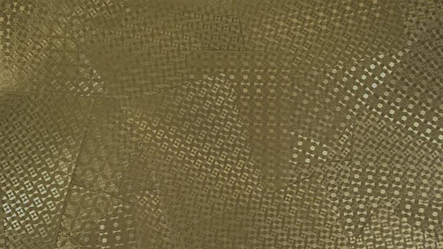 Horizontal 4K video panning across overlapping gold playing card backs with reflective geometric patterns creating a luxury abstract background.