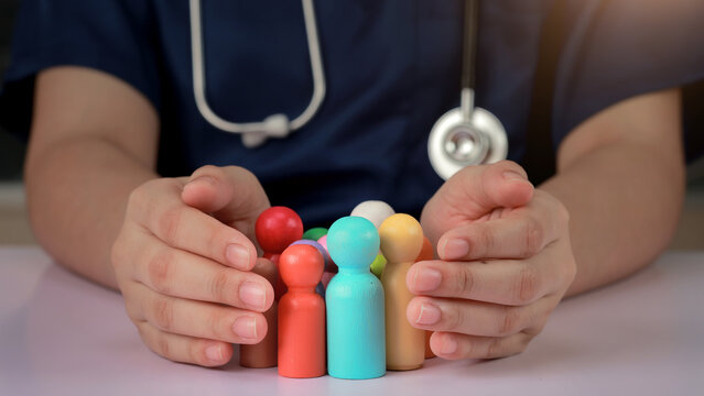 Compassionate doctor hand shielding wood figure family ensuring patient privacy protection with reassuring professional healthcare support