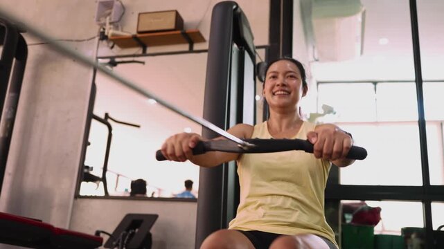 Hyrox race row pull heavy effort HIIT sport active asia people young Gen Z woman self care. High VO2 max cross power full core body hybrid cardio muscle weight loss anti aging modern gym living.