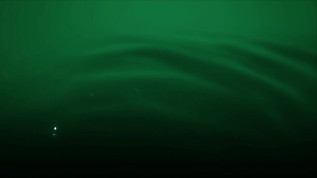 Luxury emerald green wave light overlay background abstract texture motion dreamy calm minimal design with soft flowing water surface and glowing bokeh effect for elegant modern creative banner