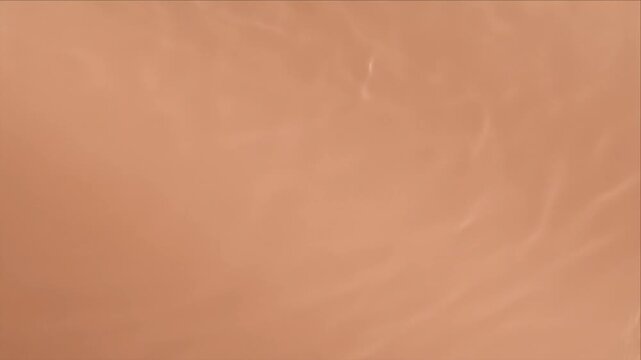 Luxury soft light overlay background with gentle brown tone water texture and subtle ripple wave pattern for elegant calm beauty design aesthetic motion scene with minimal warm shimmer dreamy soft