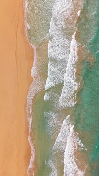 Stunning aerial drone footage of a tropical beach in Puerto Rico with turquoise waters and white sand.