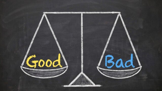 Balance scale with Good vs Bad, moral choices, weighing pros and cons, decision making concept