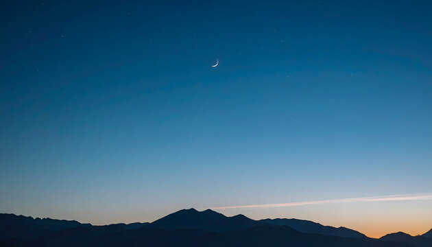 Crescent moon above a quiet mountain silhouette during twilight creating a minimal calm peaceful meditative zen landscape photograph generative AI