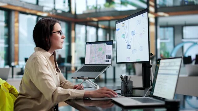 Female Forensic Analyst Deeply Studies Criminal Network Charts