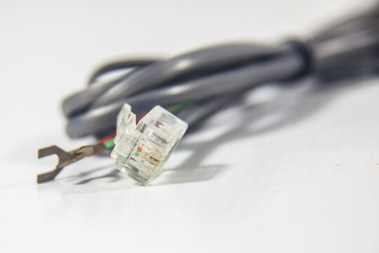 Telephone Cable, RJ connector, telecommunication technology transfer, network solutions, digital hardware global equipment, selective focus, shallow depth of field, Cairo Egypt