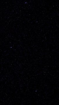 Deep Space Star Field. Countless blue-white stars drift slowly across a dark cosmic background. Ideal for space-themed projects.