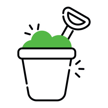 Shovel with mud and basket denoting concept of mud pail 