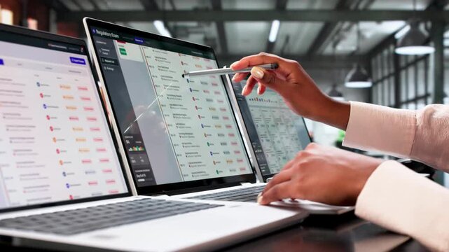 Regulatory Compliance Manager Reviews Audit Findings On Laptop