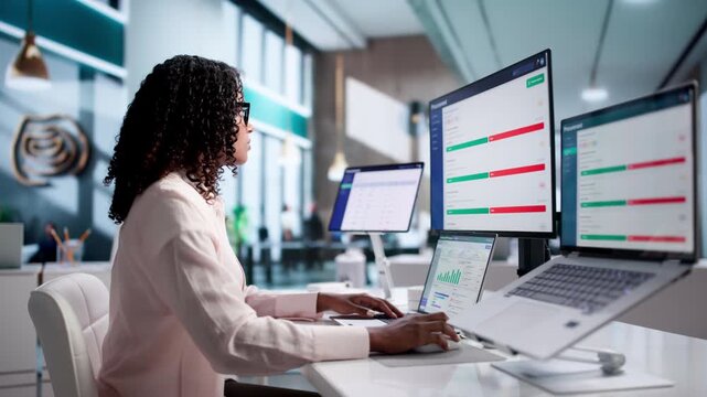Procurement Manager Reviews Supplier Contracts On Laptop