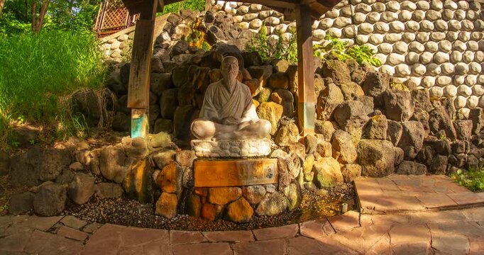 Jozankei Onsen Monk Statue Day Timelapse: Miwamu Jozan Monument at Gensen Park, Sapporo, Hokkaido, Japan - Wide Angle Shot