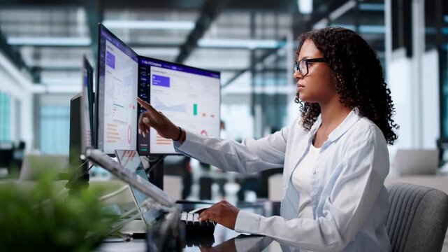 Compliance Officer Reviews AML Software Dashboard