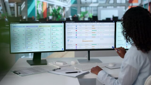 Sales Manager Studies Pipeline Data On Her Computer