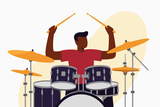 Energetic male drummer playing a dark blue drum kit with wooden sticks against an abstract background.