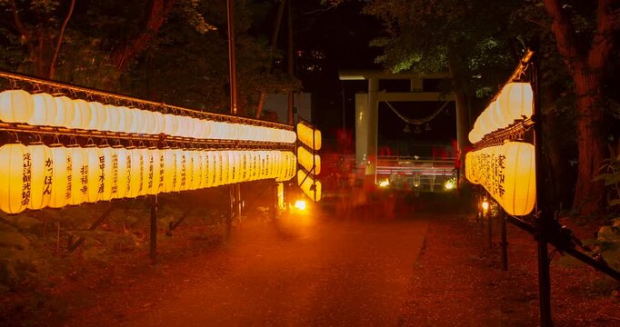 Japanese Shrine Lantern Festival Night Timelapse: Illuminated Paper Lanterns and Torii Gate, Sapporo, Hokkaido, Japan - Wide Angle Shot
