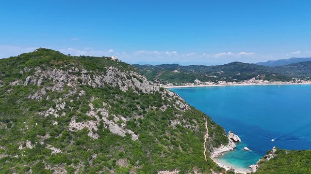 Aerial drone flying over Porto Timoni beach and rocky coastline in Corfu