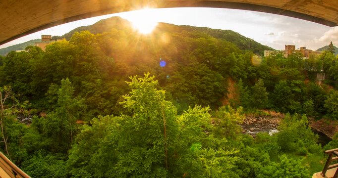 Jozankei Ryokan Room View Day Timelapse: Sunset over Toyohira River Valley and Lush Green Mountains, Sapporo, Hokkaido, Japan - Wide Angle Shot