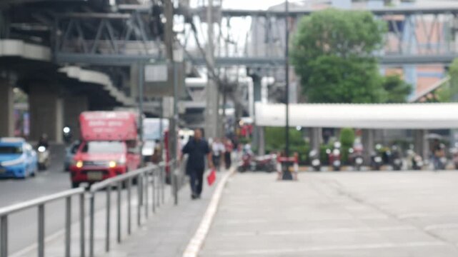 Blurred Defocused City Street Background with People Walking Under Bangkok Sky Train, Urban Bokeh Backdrop