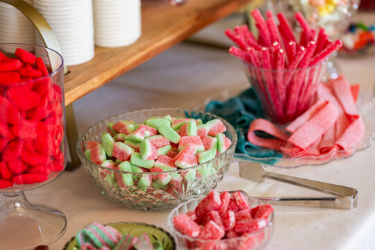 Refreshment table at event filled with sweet lolly treats
