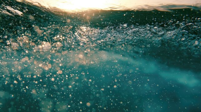 Sunlight glints on the turbulent surface of dark, deep water