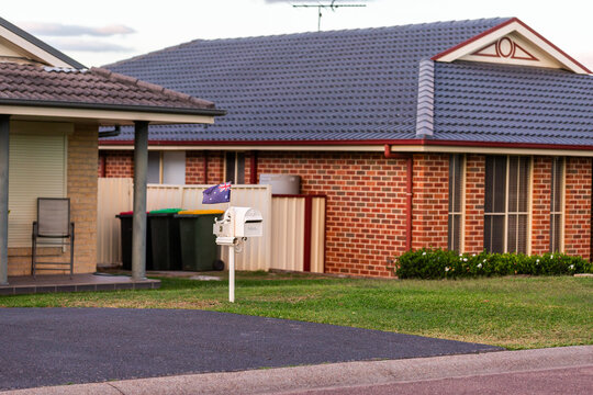 Australian flag on mailbox of Aussie home at dusk