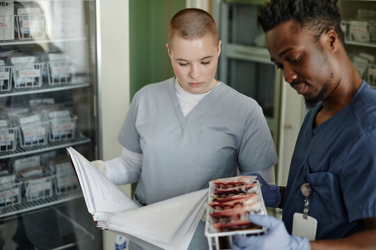 Blood donation center specialists working together at clinic