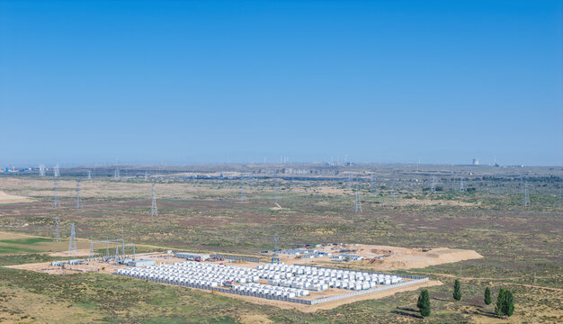 Aerial View of a Large-Scale Battery Energy Storage Plant Under Construction in the Gobi Desert Near an Energy and Chemical Industrial Complex