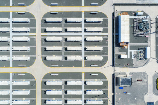 Aerial Top-View of a Grid-Scale Battery Energy Storage Facility with Organized Modular Container Arrays and Electrical Infrastructure