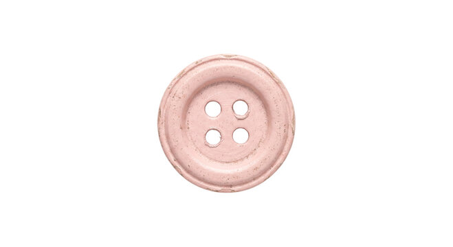Single vintage pink button with four holes and distressed edges on white background