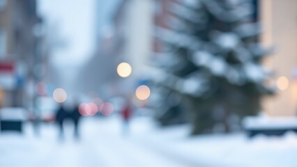 Obraz premium Winter Street Scene: A blurred winter street scene unfolds with soft bokeh lights, snow-covered trees, and silhouetted figures walking through the falling snow, evoking a sense of serene.