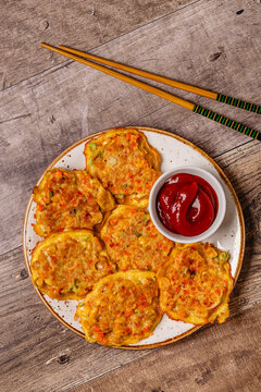 Fried Korean pancakes (jeon) with tuna and vegetables