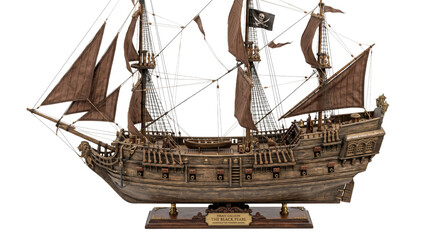 Intricate model of the Black Pearl pirate ship with Jolly Roger flag © Sapphire