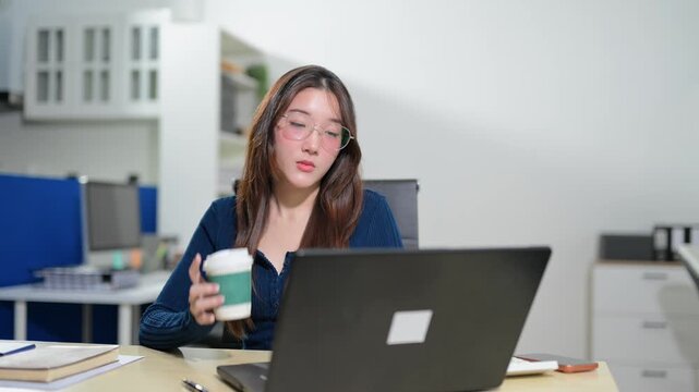 Asian lawyer consults with a client in a modern law office, discussing contracts, legal strategy, business compliance and corporate advisory during a professional meeting.